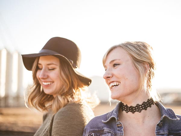 Two beautiful Ukrainian women smiling.