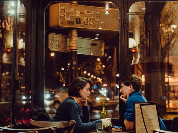 A couple savoring a romantic dinner date at a restaurant in Kiev Ukraine